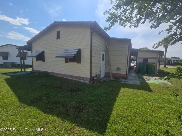 $130,000 | 623 Marlin Circle, Barefoot Bay, FL 32976