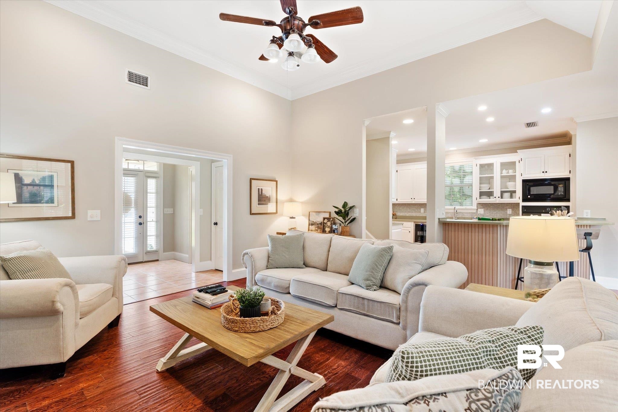 30648 Pine Court Daphne, AL 36527 - Photo 6 of 30 Living room featuring wood-type flooring, ceiling fan, and crown molding