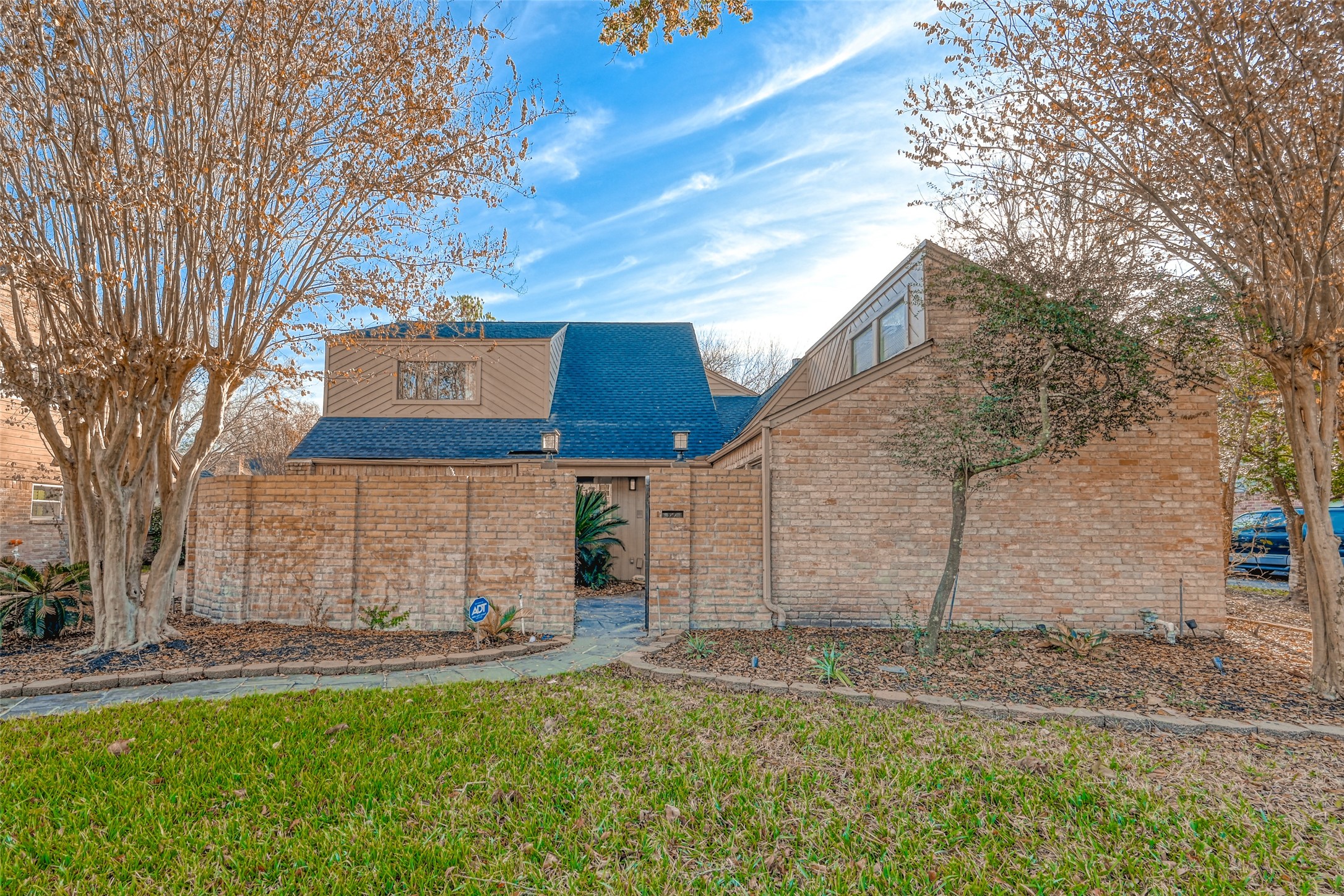 2107 Shadowbriar Drive Houston, TX 77077 - Photo 2 of 23 a view of a house with a yard