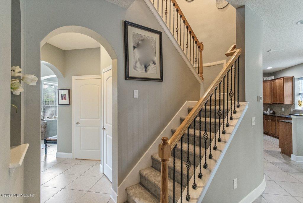 221 North Saxxon Road St. Augustine, FL 32092 - Photo 17 of 64 Hallway Leading to 1/2 Bath and Garage