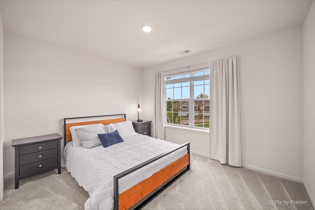 1623 BENTZ Way Batavia, IL 60510 - Photo 14 of 29 a bedroom with a bed and a window