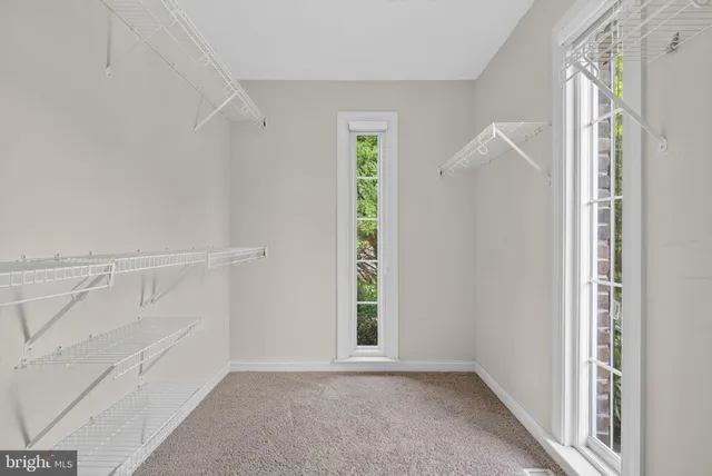 a view of a room with racks on the wall