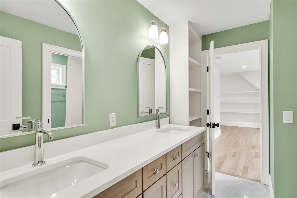 232 Lincoln Street Lexington, MA 02421 - Photo 29 of 41 a bathroom with a sink and a mirror
