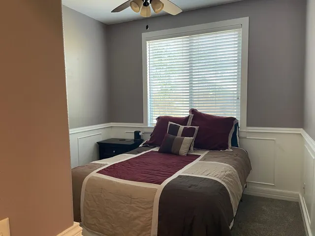 an empty room with shelves