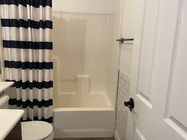 a view of a big room with a yard and plants