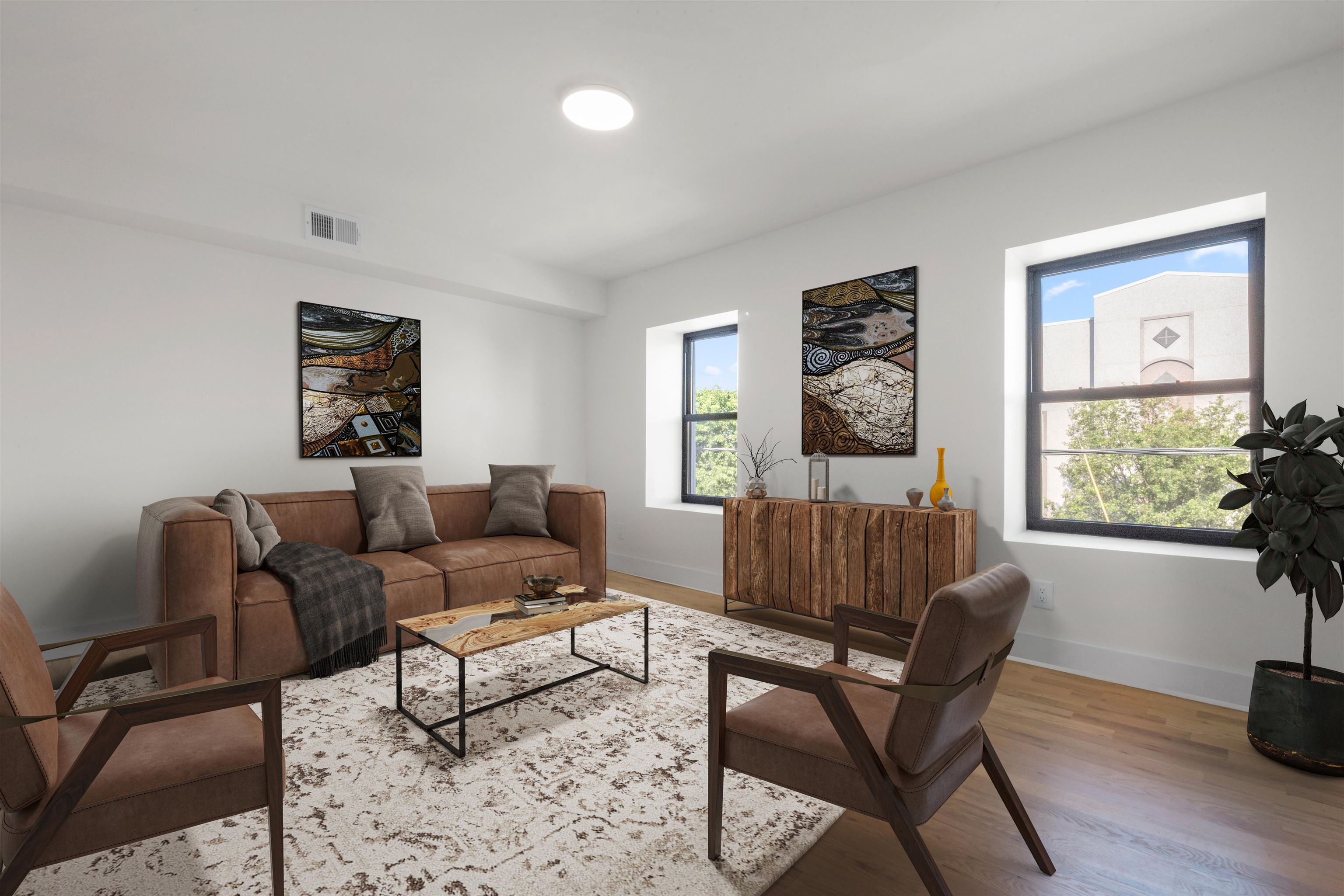 850 West Side Avenue, Unit 13 Jersey City, NJ 07306 - Photo 3 of 16 a living room with furniture and a window