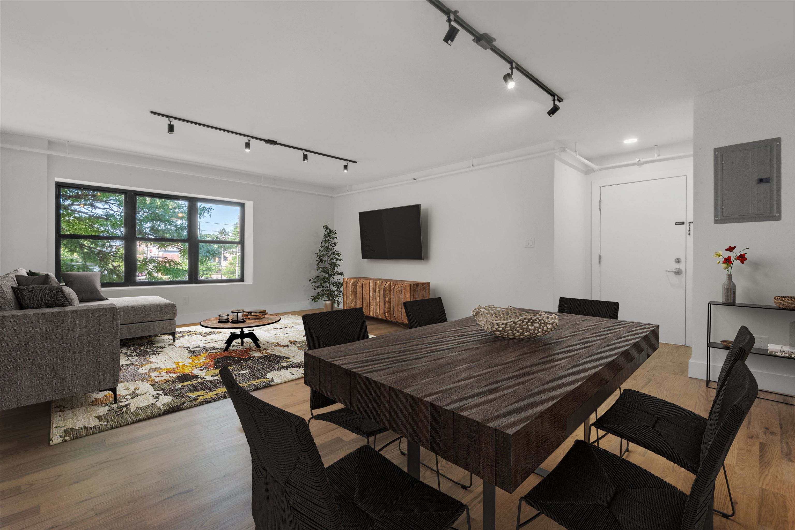 850 West Side Avenue, Unit 13 Jersey City, NJ 07306 - Photo 4 of 16 a view of a dining room with furniture