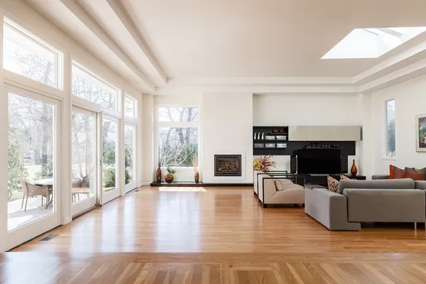 a living room with fireplace furniture and a flat screen tv