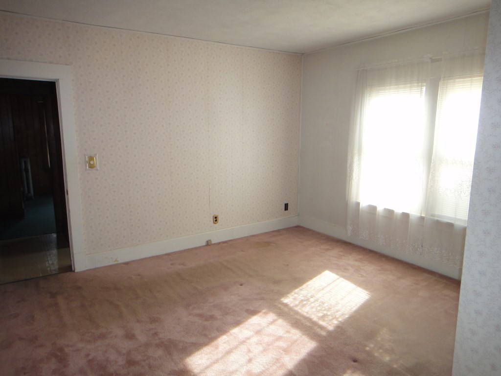 27-29 Howes Street Springfield, MA 01118 - Photo 8 of 28 a view of empty room with window