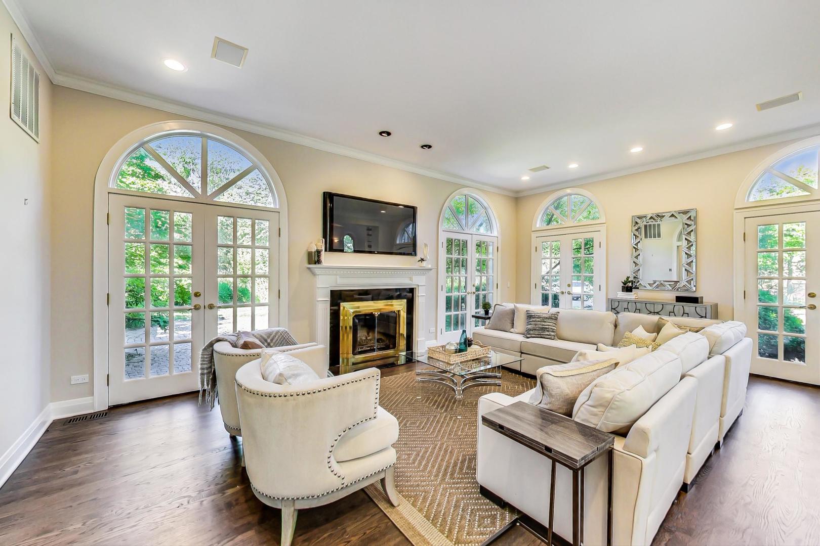 1037 Hillside Road Northbrook, IL 60062 - Photo 15 of 46 a living room with furniture fireplace and a large window