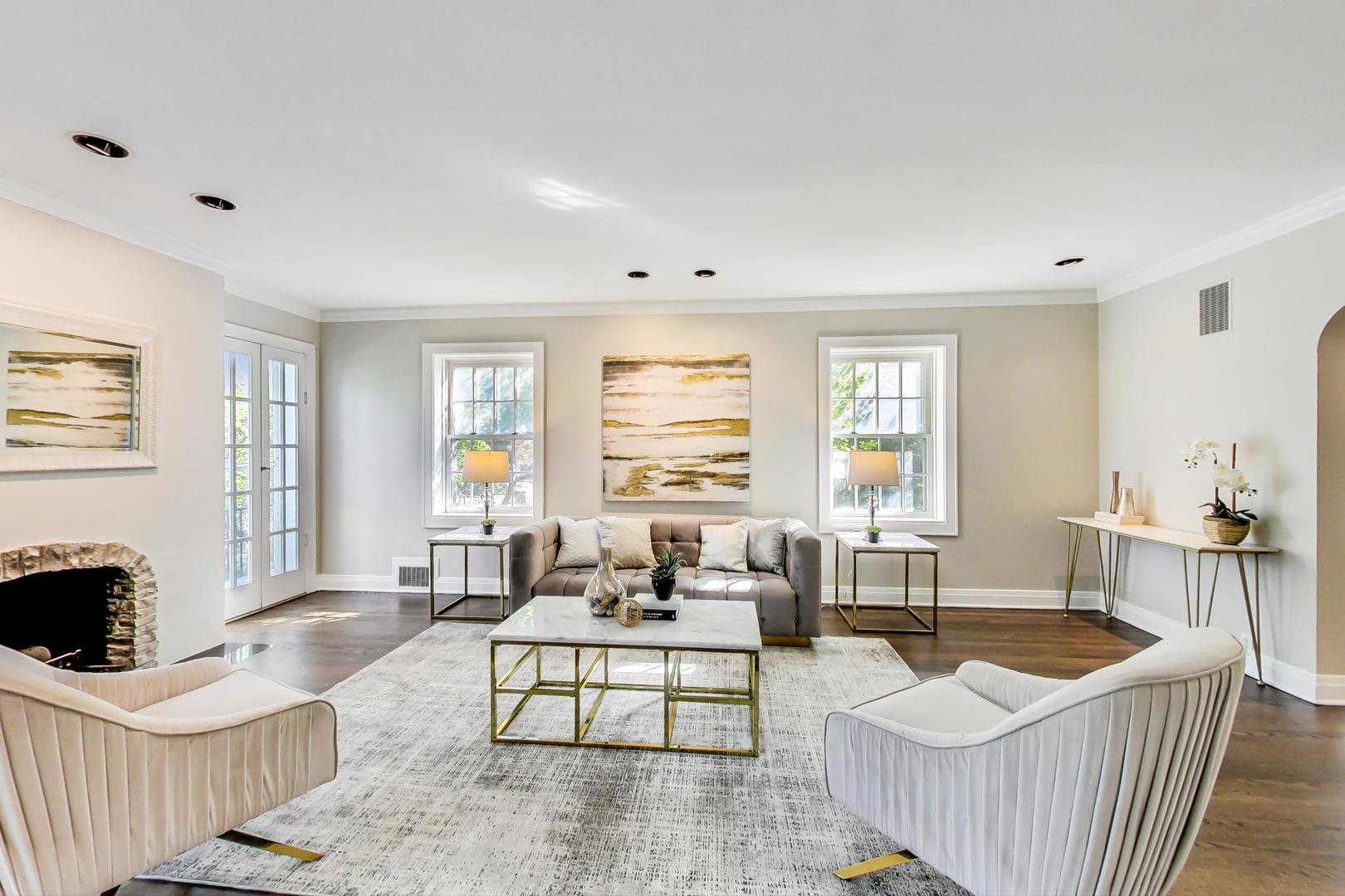 1037 Hillside Road Northbrook, IL 60062 - Photo 2 of 46 a living room with furniture and a fireplace