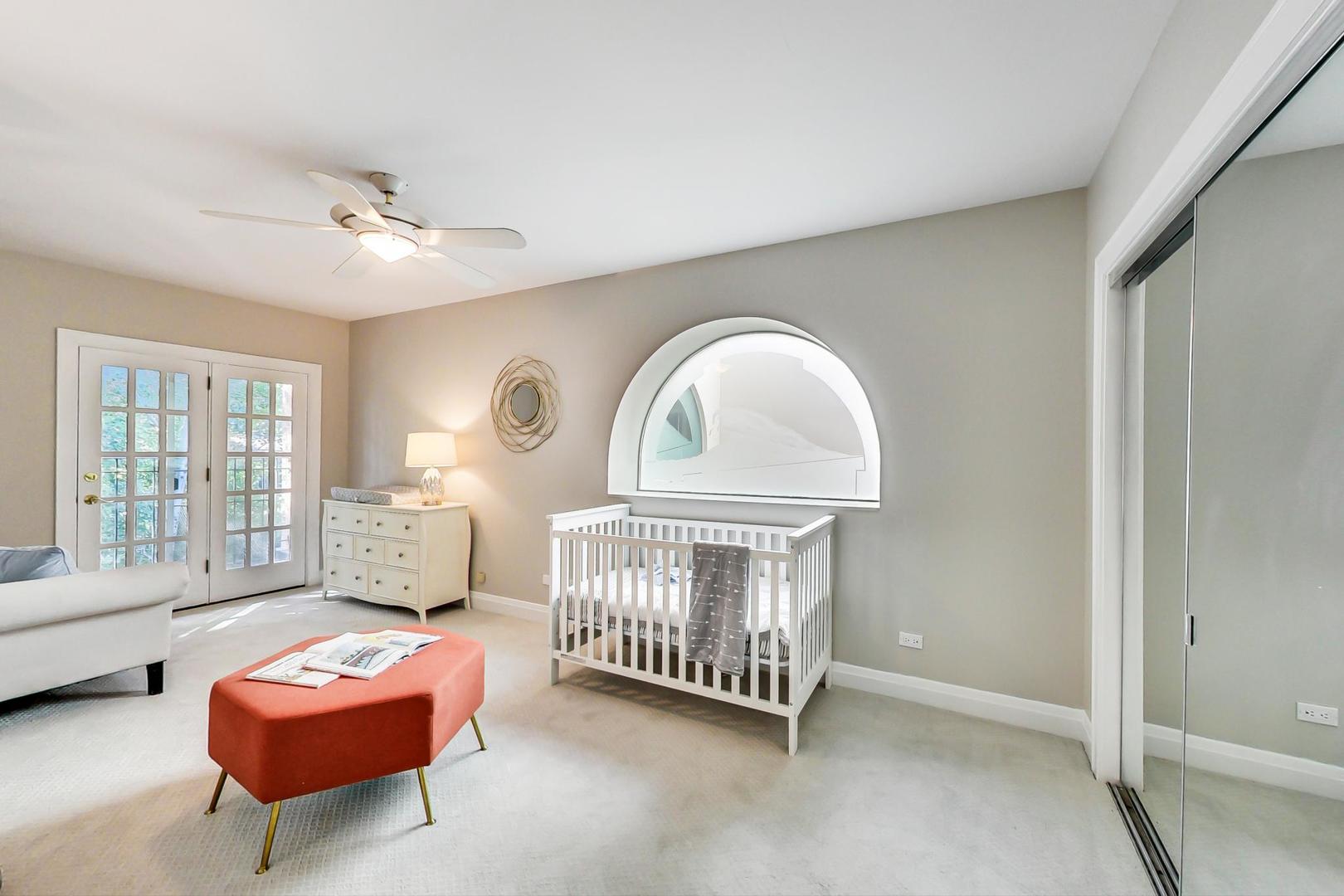 1037 Hillside Road Northbrook, IL 60062 - Photo 28 of 46 a bedroom with furniture and a window
