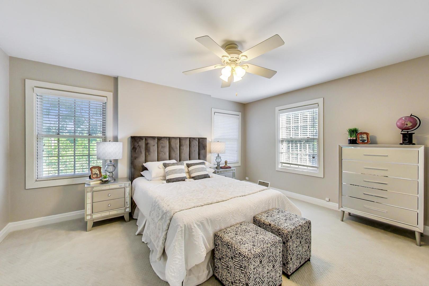 1037 Hillside Road Northbrook, IL 60062 - Photo 30 of 46 a bedroom with a bed and a window