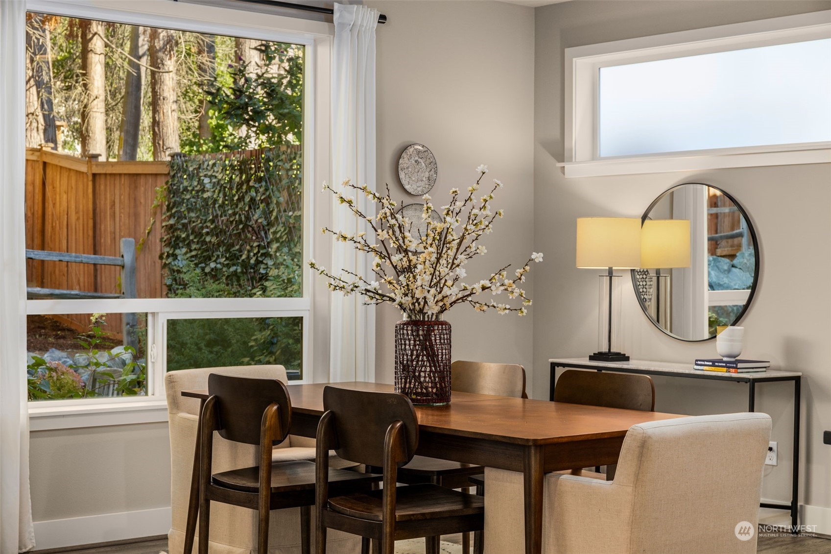 1243 Northwest Richmond Beach Road Shoreline, WA 98177 - Photo 13 of 40 a view of a dining room with furniture window and outside view