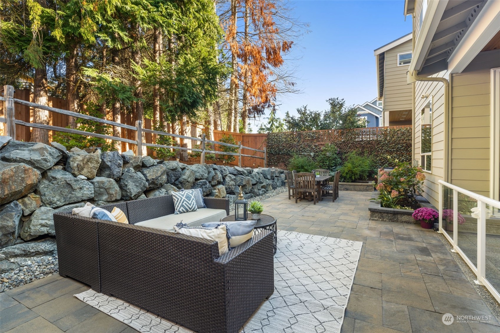 1243 Northwest Richmond Beach Road Shoreline, WA 98177 - Photo 15 of 40 a view of a patio with couches and potted plants