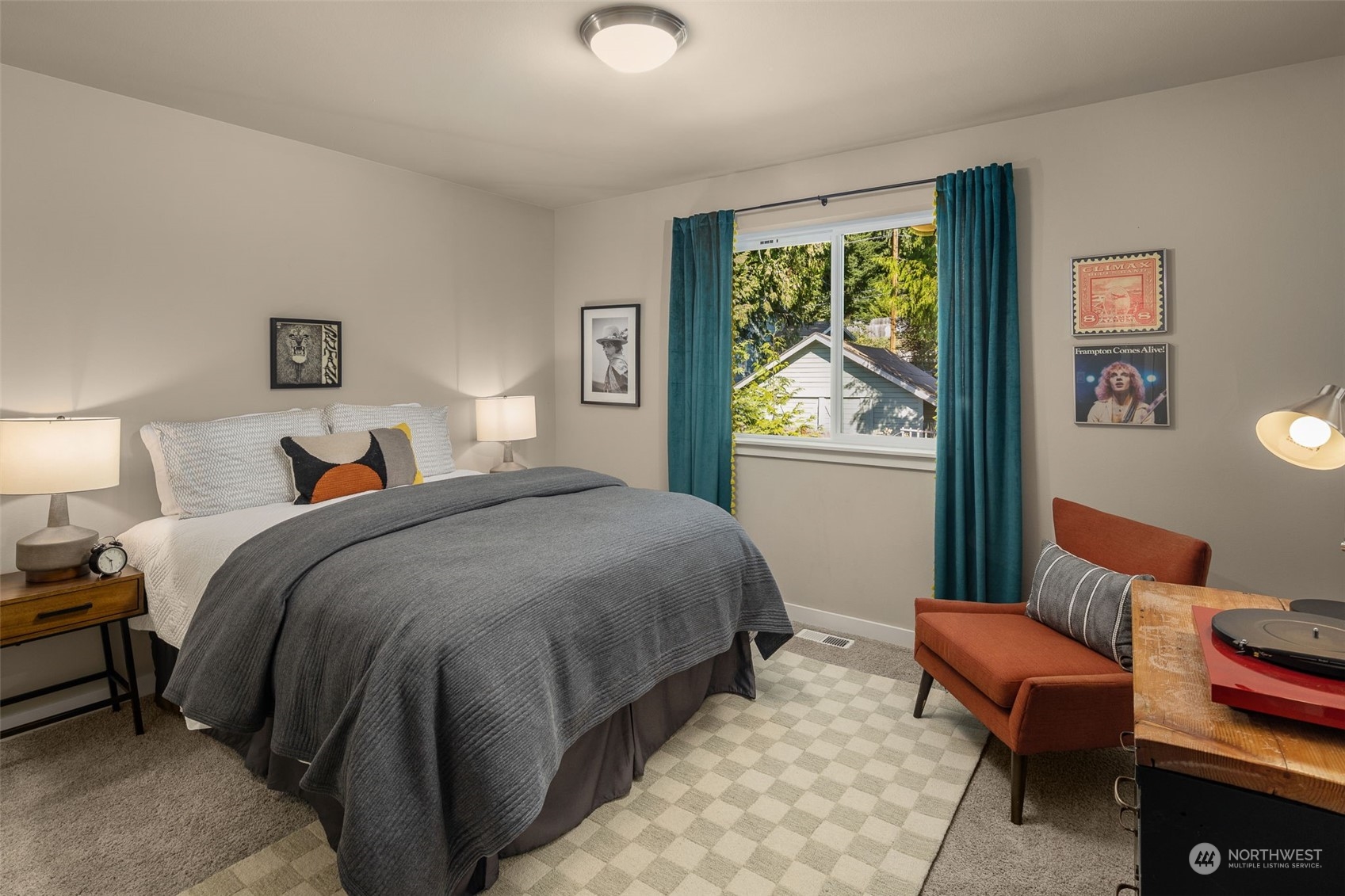 1243 Northwest Richmond Beach Road Shoreline, WA 98177 - Photo 29 of 40 a bed room with a bed and a chair
