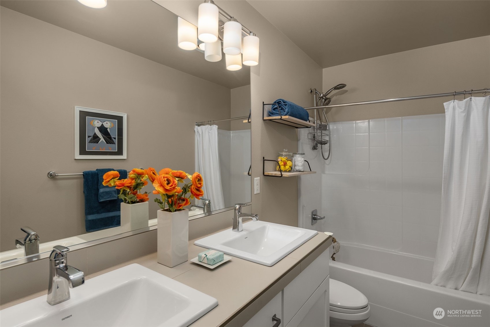 1243 Northwest Richmond Beach Road Shoreline, WA 98177 - Photo 30 of 40 a bathroom with a sink a toilet and shower
