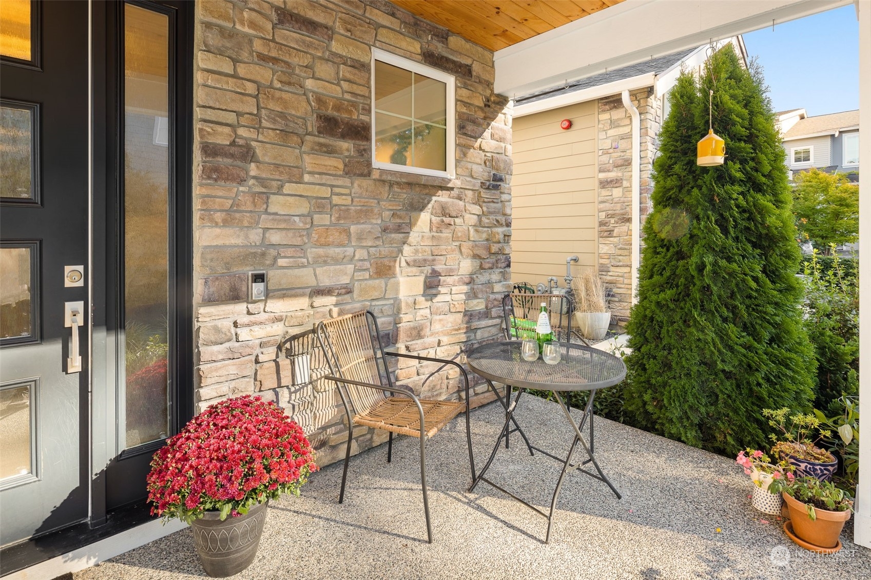 1243 Northwest Richmond Beach Road Shoreline, WA 98177 - Photo 33 of 40 a table and chairs in front of a door
