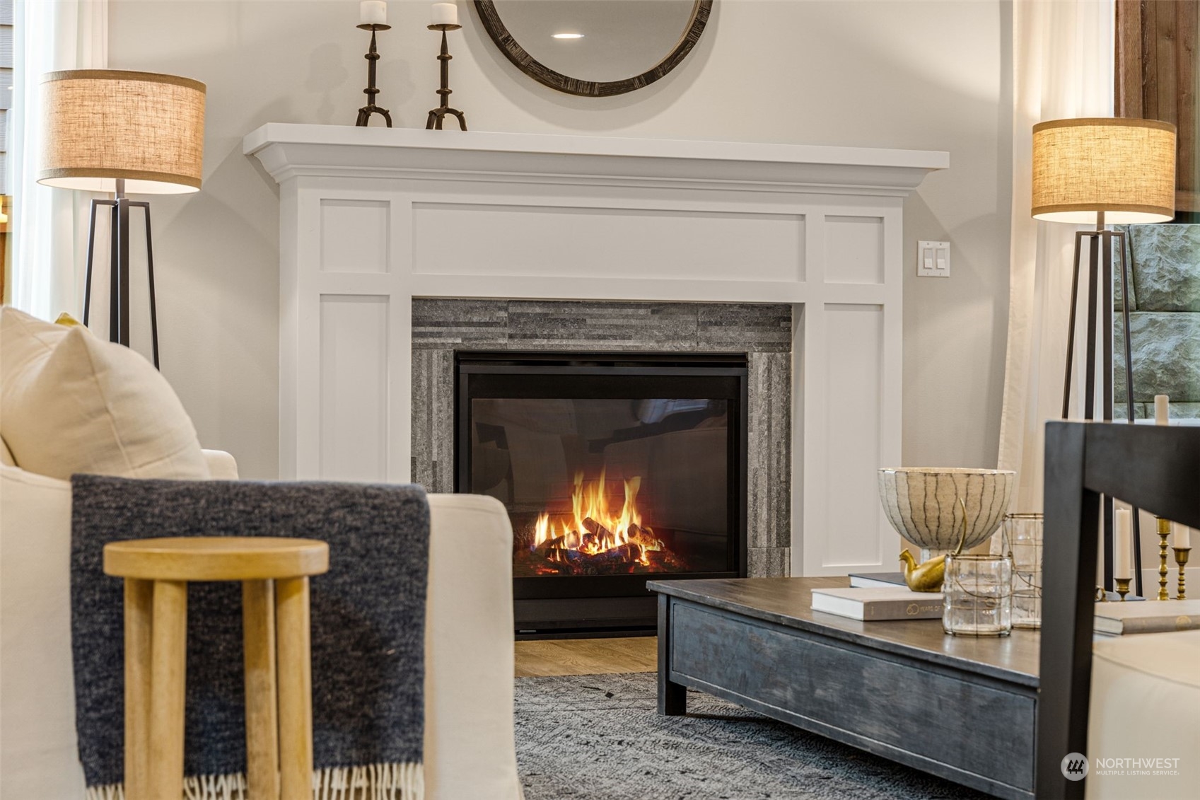 1243 Northwest Richmond Beach Road Shoreline, WA 98177 - Photo 4 of 40 a living room with furniture and a fireplace
