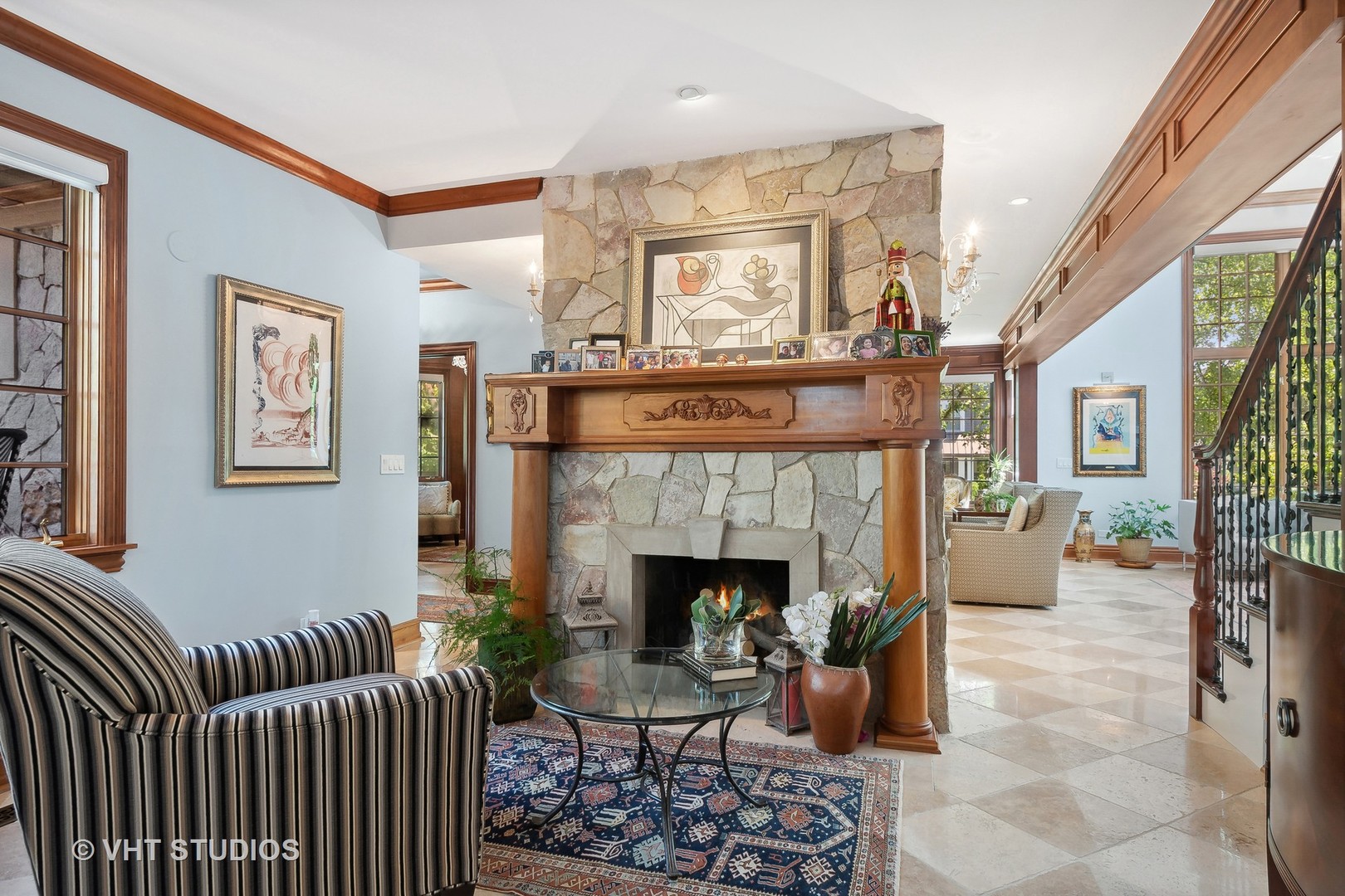 305 Central Avenue Wilmette, IL 60091 - Photo 11 of 42 a living room with furniture and a fireplace