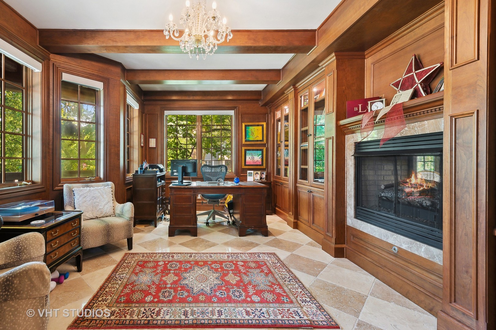 305 Central Avenue Wilmette, IL 60091 - Photo 13 of 42 a living room with furniture and a fireplace