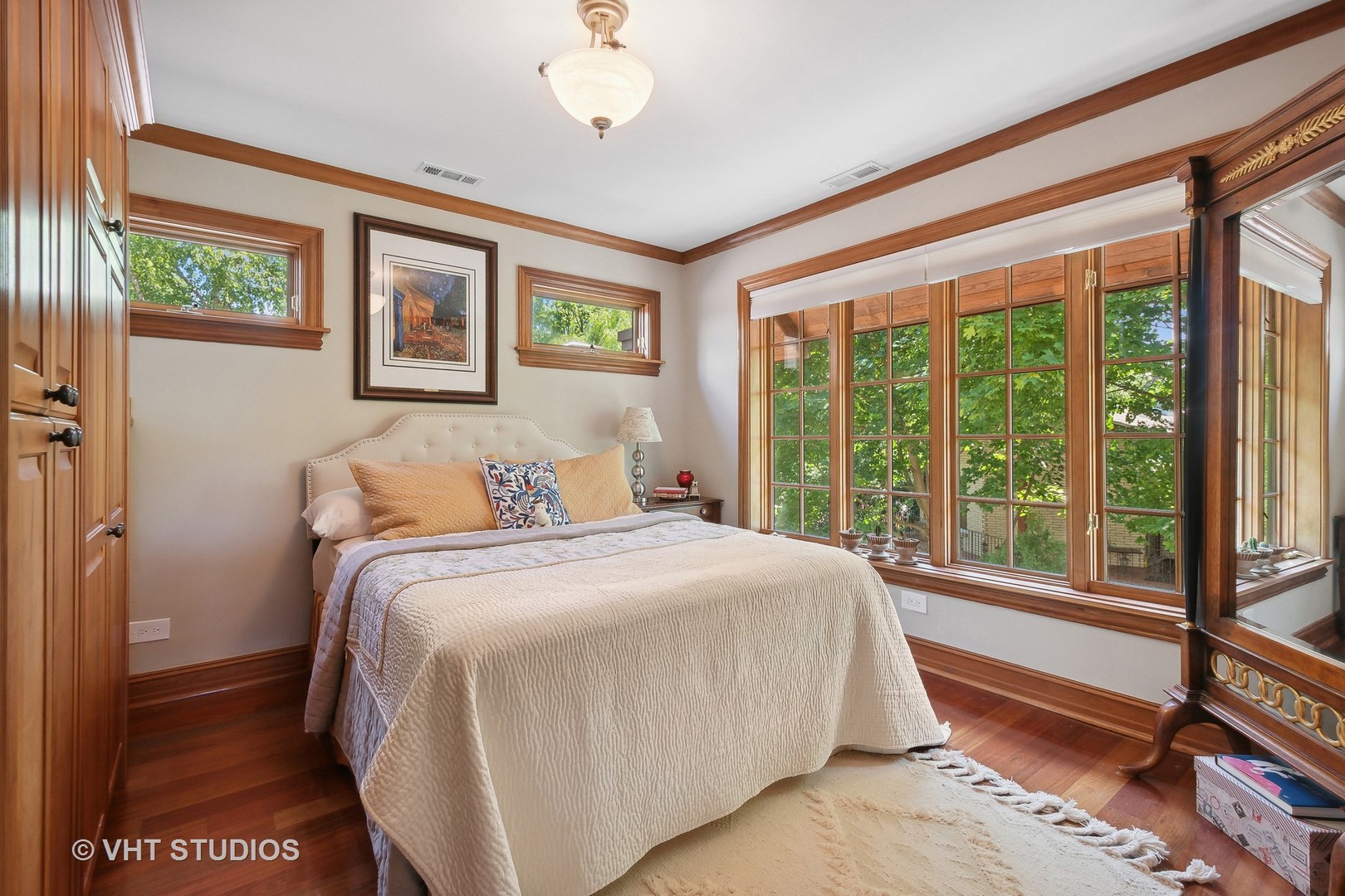 305 Central Avenue Wilmette, IL 60091 - Photo 18 of 42 a bedroom with a large bed and a large window