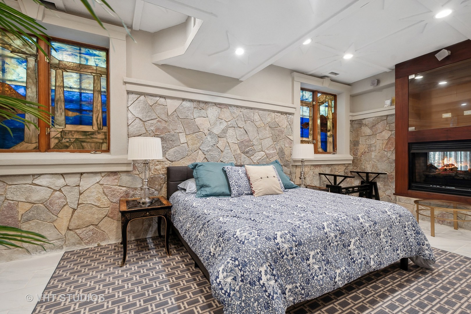 305 Central Avenue Wilmette, IL 60091 - Photo 24 of 42 a bedroom with a bed and glass door