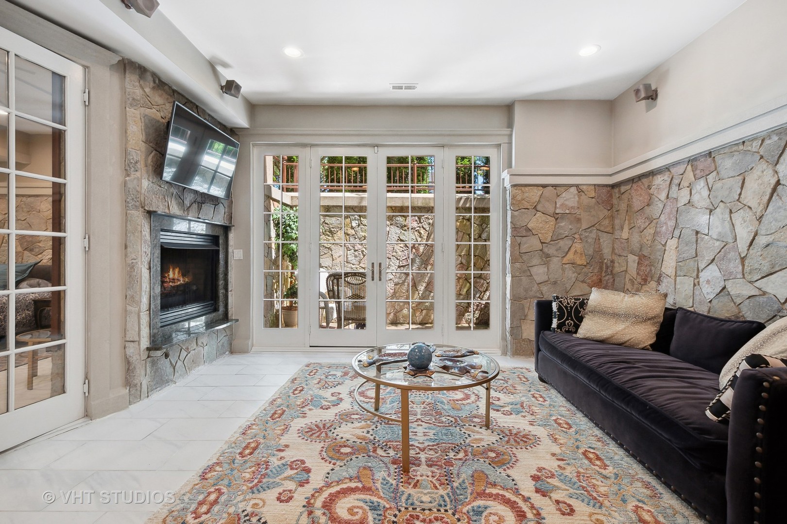 305 Central Avenue Wilmette, IL 60091 - Photo 25 of 42 a living room with furniture and a fireplace