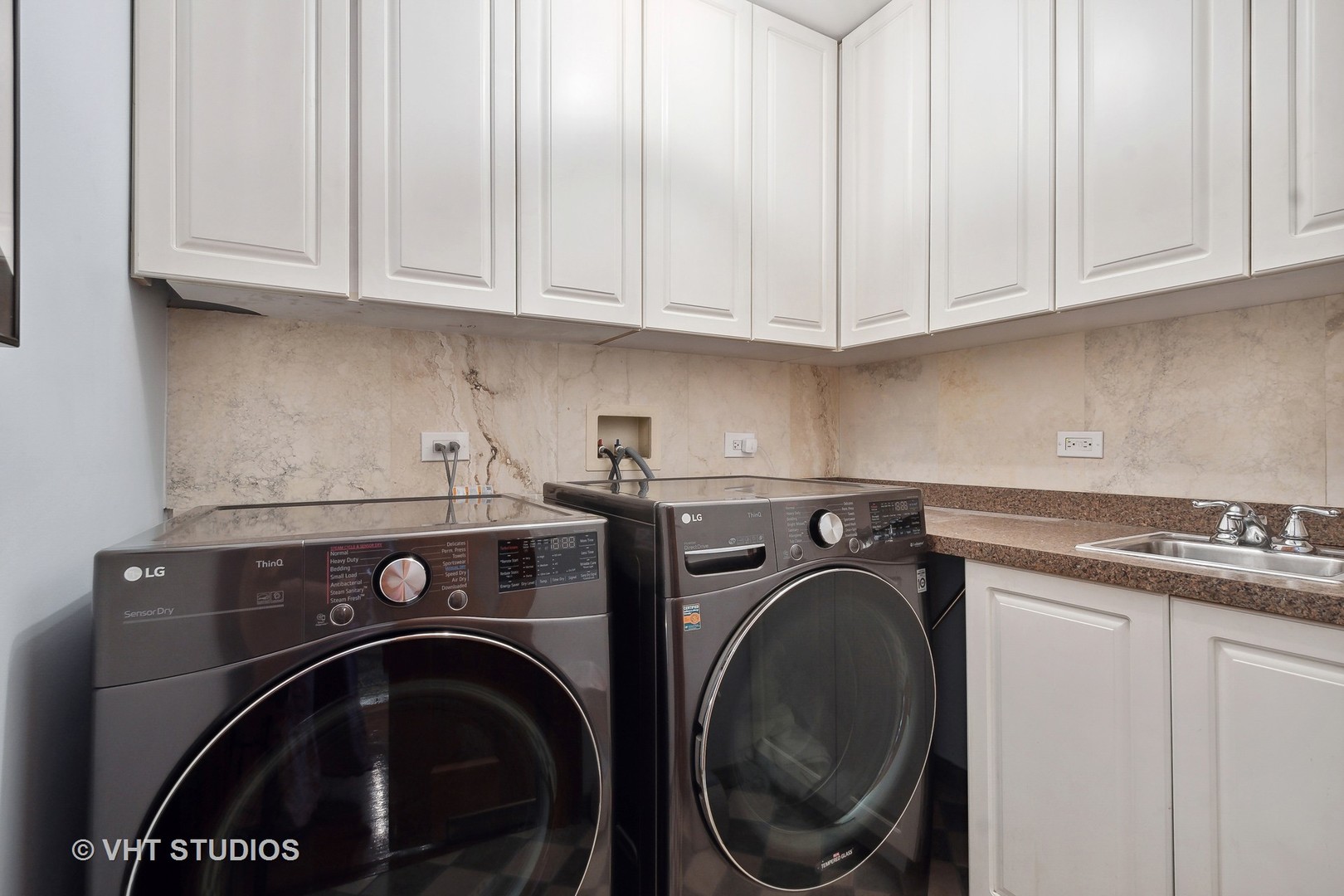 305 Central Avenue Wilmette, IL 60091 - Photo 26 of 42 a utility room with dryer and washer