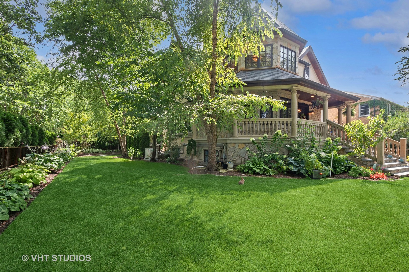 305 Central Avenue Wilmette, IL 60091 - Photo 28 of 42 a front view of a house with a garden