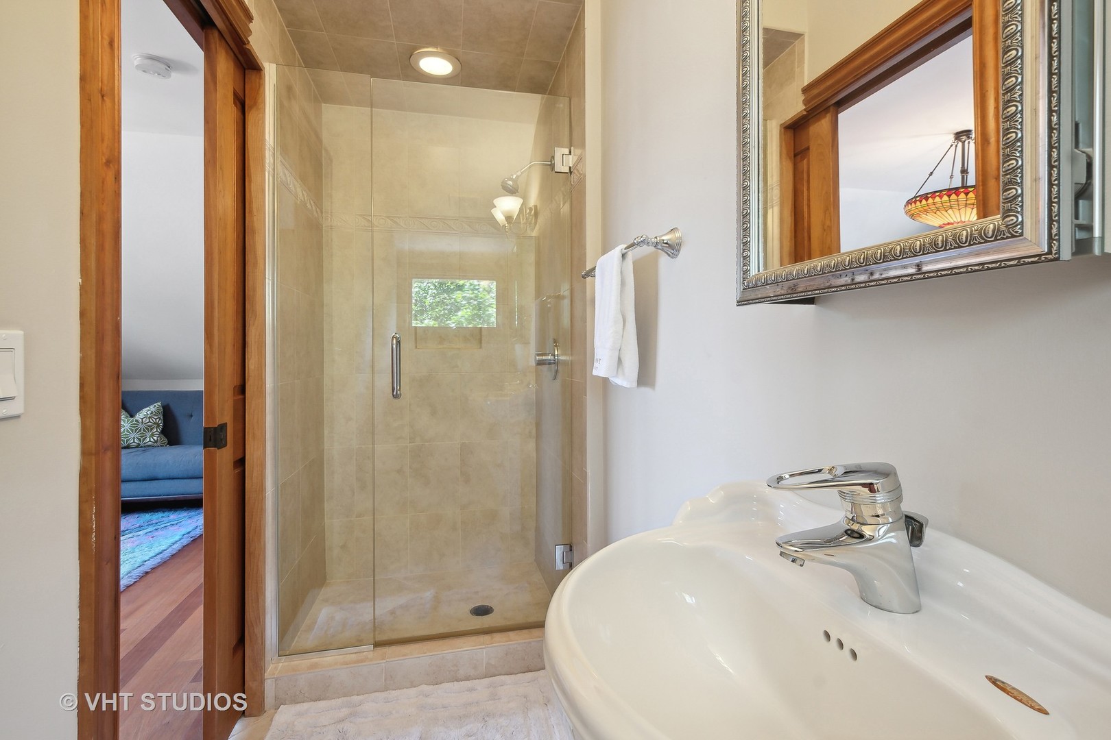 305 Central Avenue Wilmette, IL 60091 - Photo 36 of 42 a bathroom with a sink and a mirror