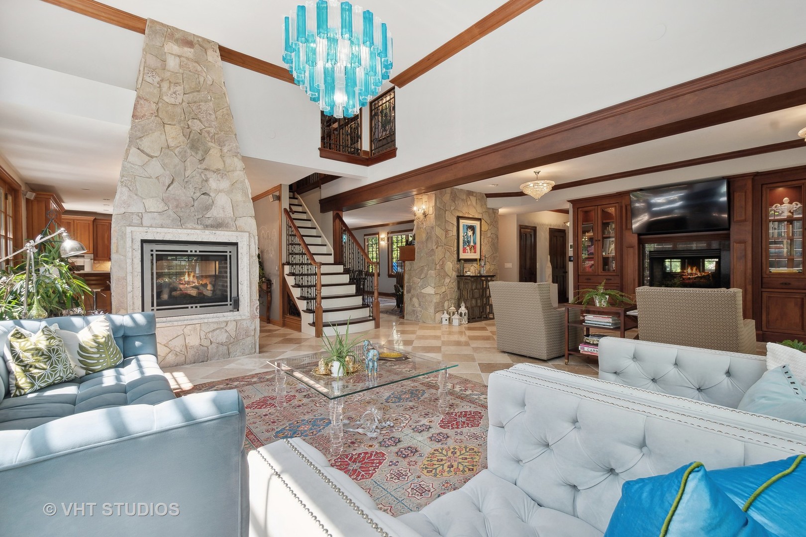 305 Central Avenue Wilmette, IL 60091 - Photo 6 of 42 a living room with furniture and a chandelier