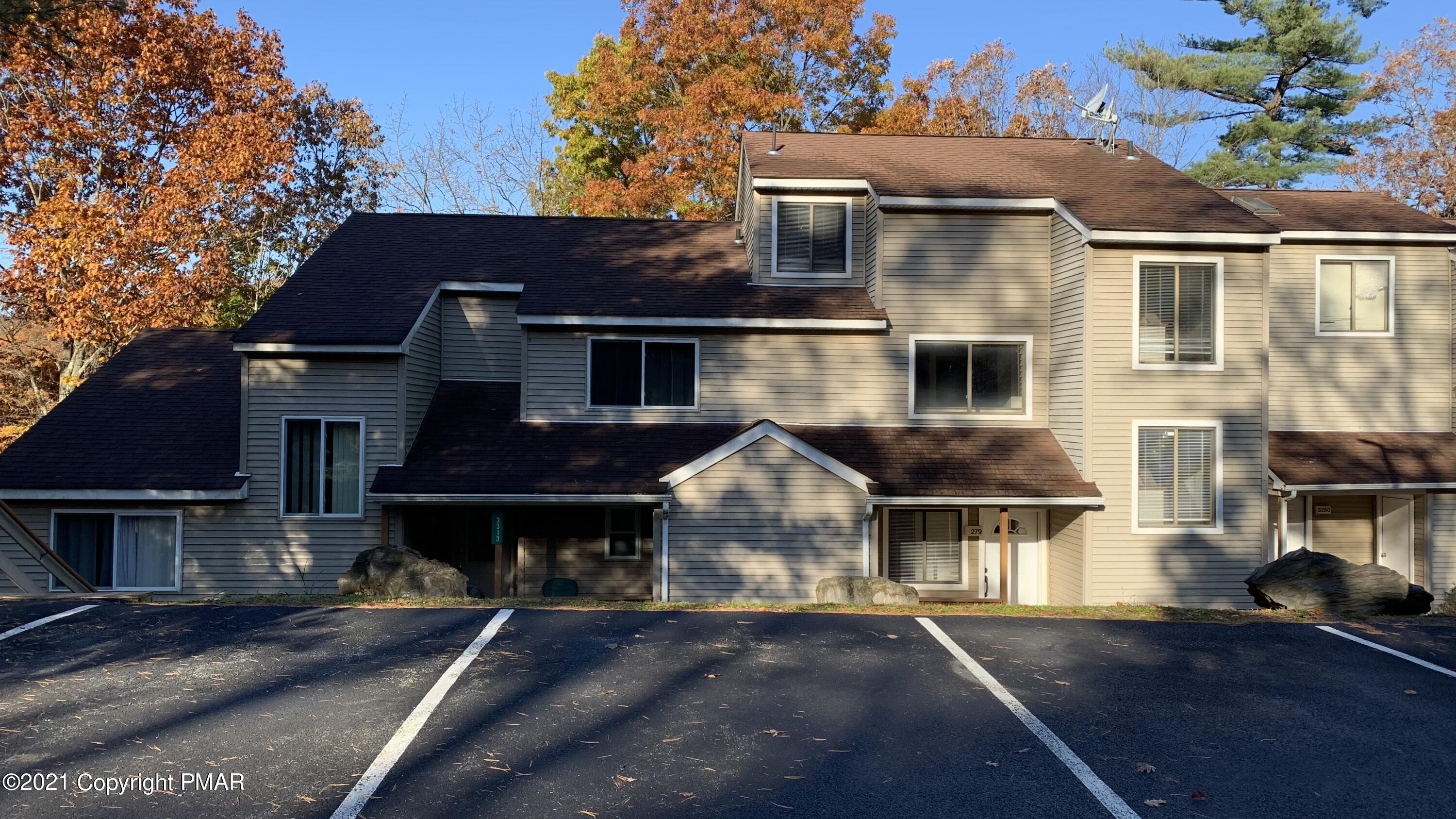 3315 Windemere Drive Bushkill, PA 18324 - Photo 1 of 55 a front view of a house with a yard and garage