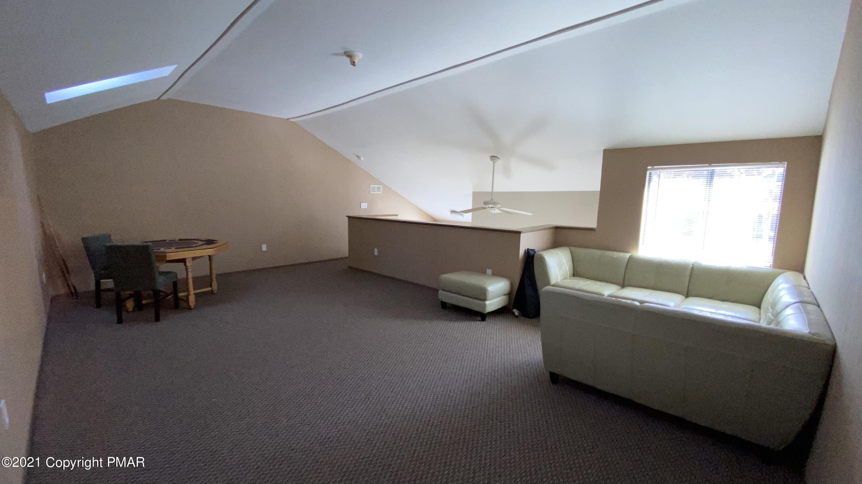 3315 Windemere Drive Bushkill, PA 18324 - Photo 34 of 55 a living room with furniture and a piano
