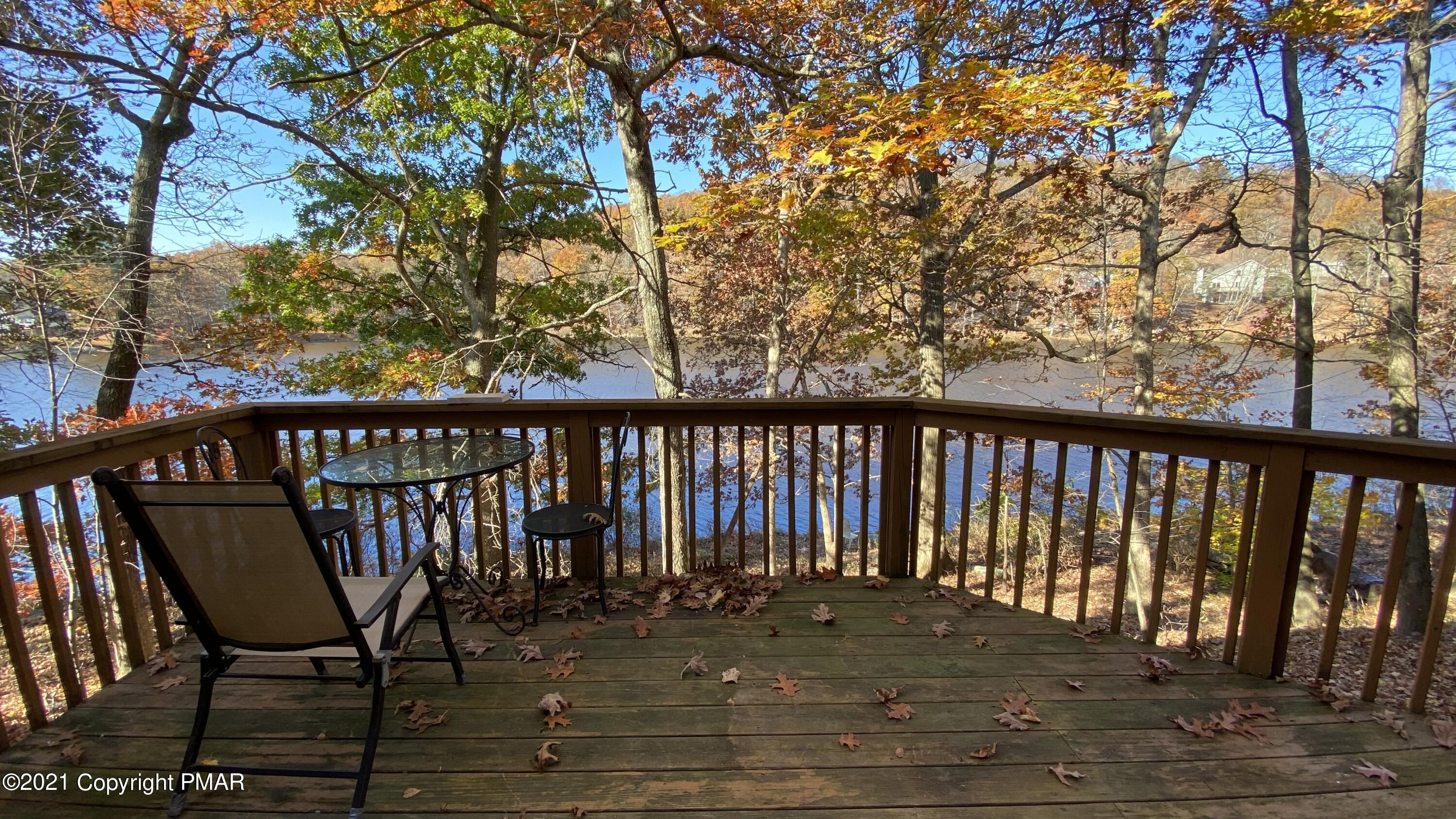 3315 Windemere Drive Bushkill, PA 18324 - Photo 38 of 55 a balcony with wooden floor and fence