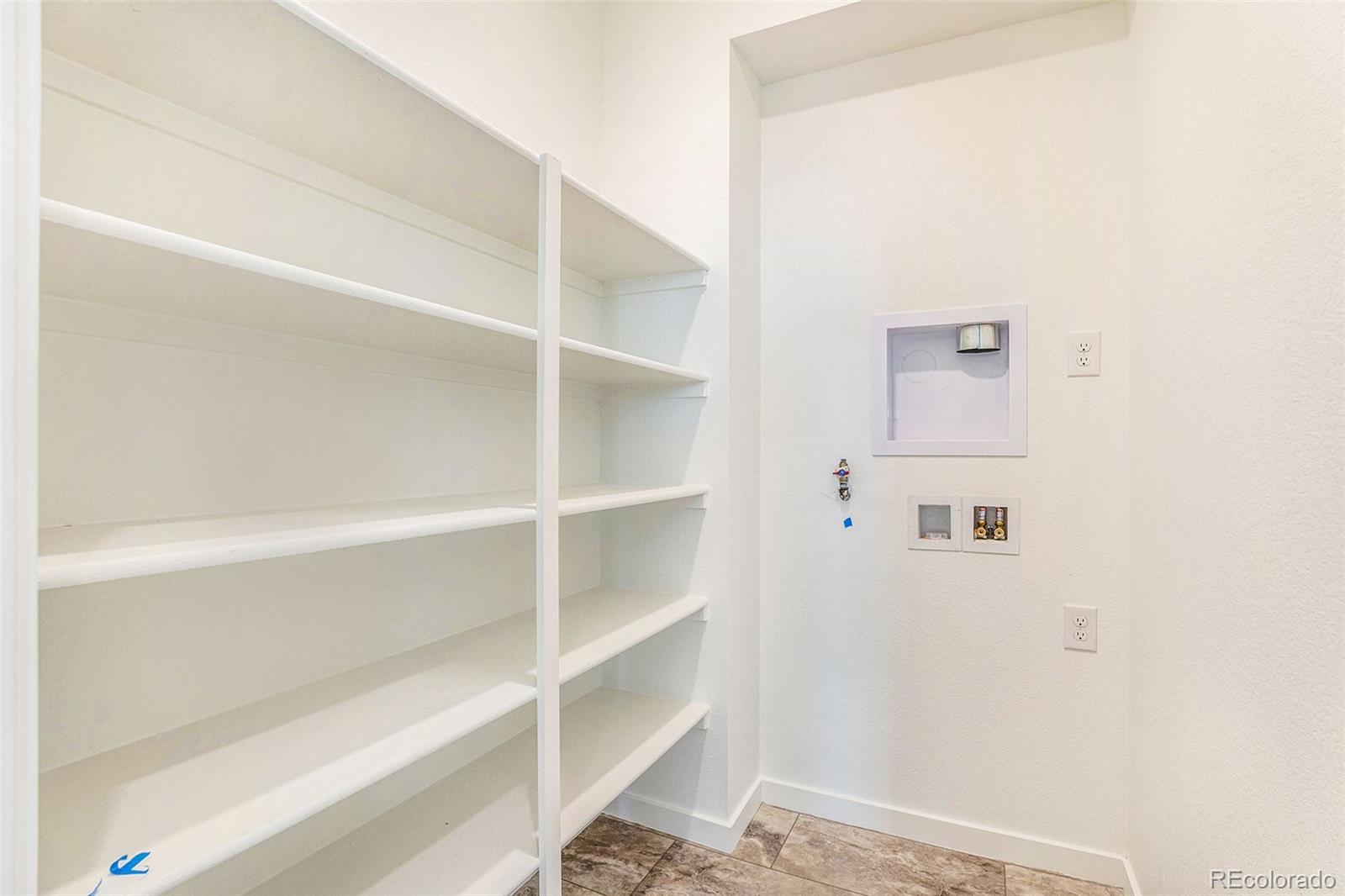 874 Furrow Way Lafayette, CO 80026 - Photo 16 of 27 a view of an empty walk in closet