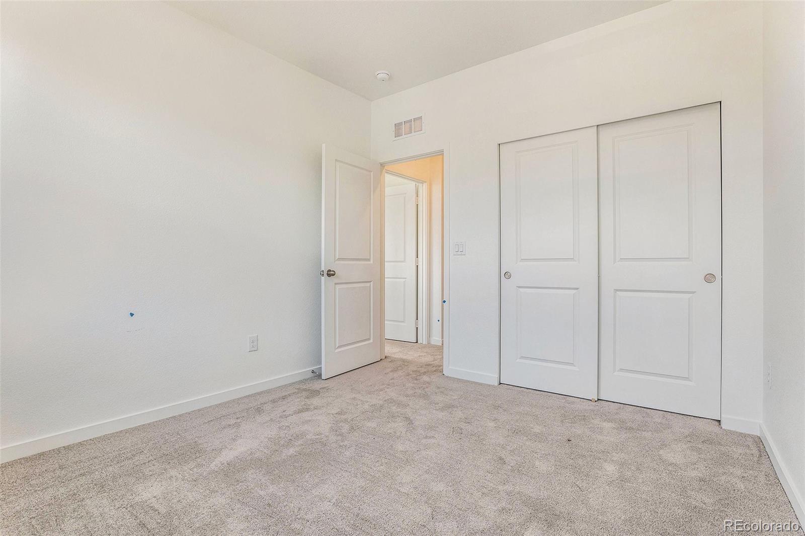 874 Furrow Way Lafayette, CO 80026 - Photo 18 of 27 a view of an empty room