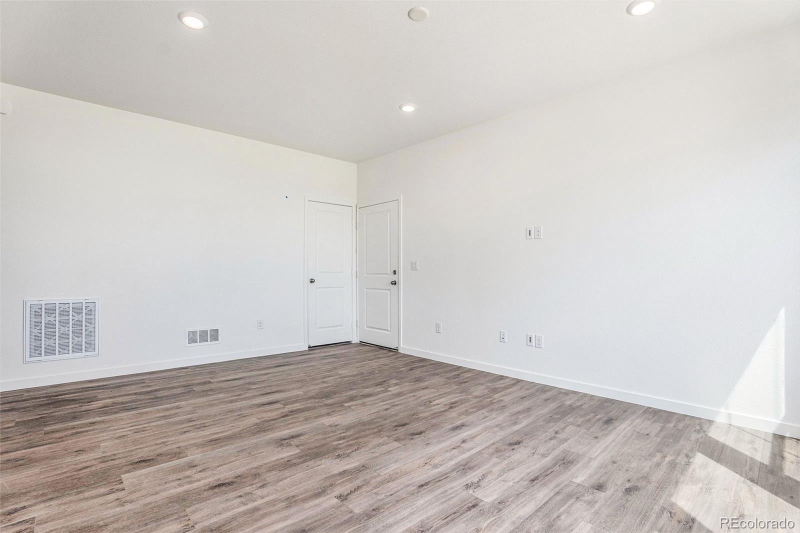 874 Furrow Way Lafayette, CO 80026 - Photo 9 of 27 wooden floor in a room