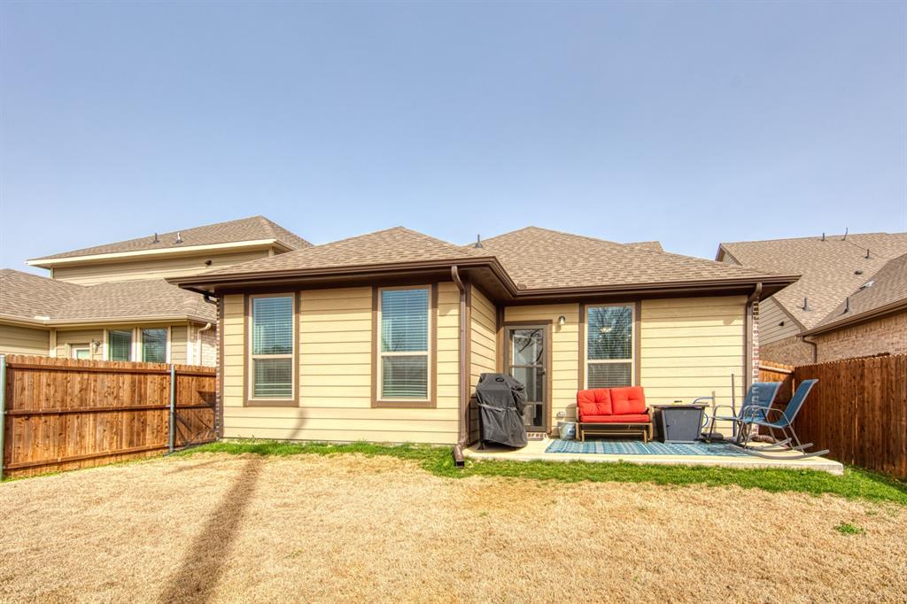 145 Cole Road Pilot Point, TX 76258 - Photo 14 of 14 a backyard of a house with barbeque oven table and chairs