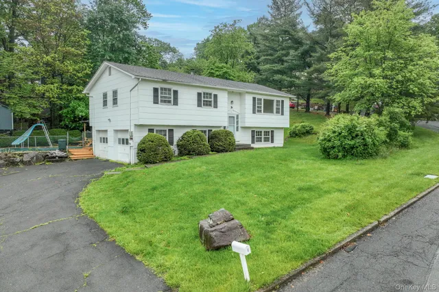 a house view with a garden space
