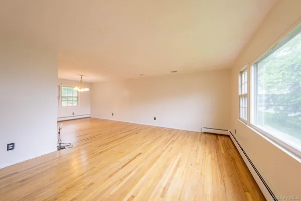a view of an empty room and window