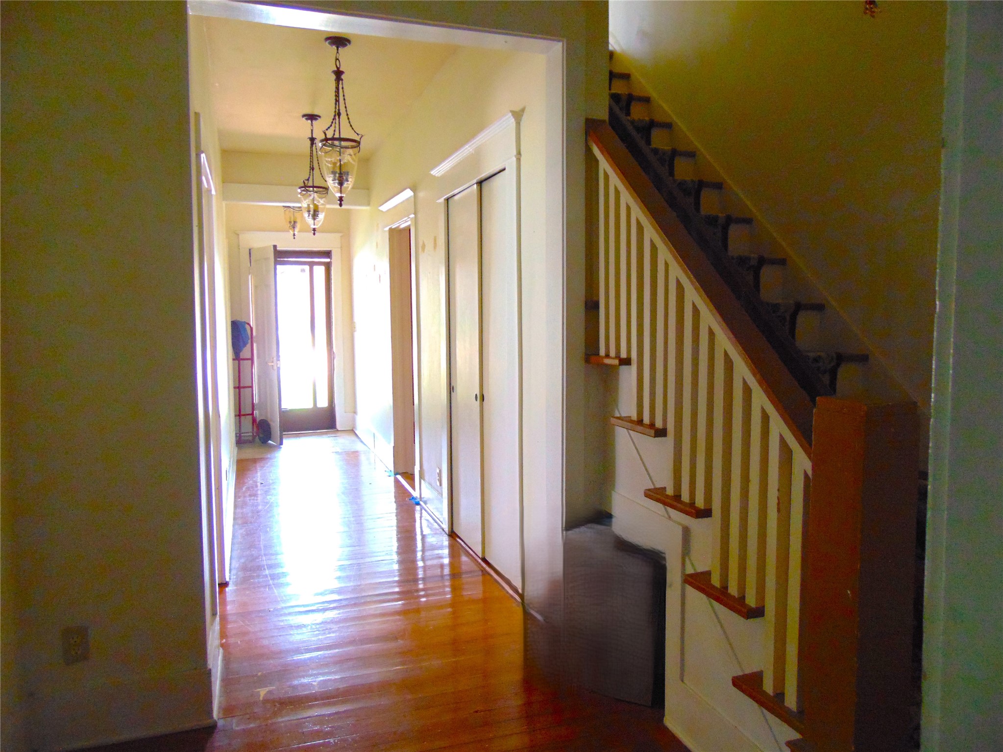 100 West Caroline Street Trinity, TX 75862 - Photo 12 of 28 a view of a hallway with wooden floor and staircase