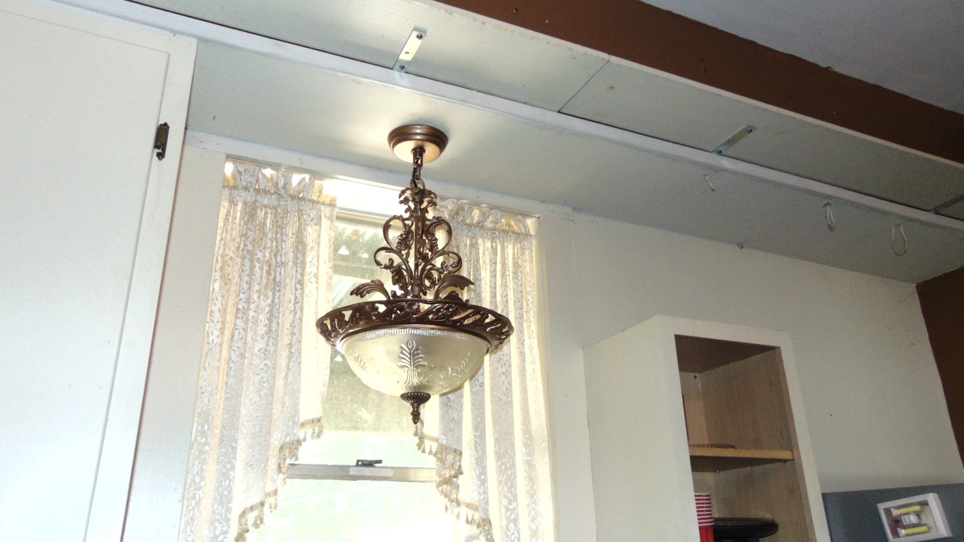 100 West Caroline Street Trinity, TX 75862 - Photo 15 of 28 a view of a hallway with a chandelier