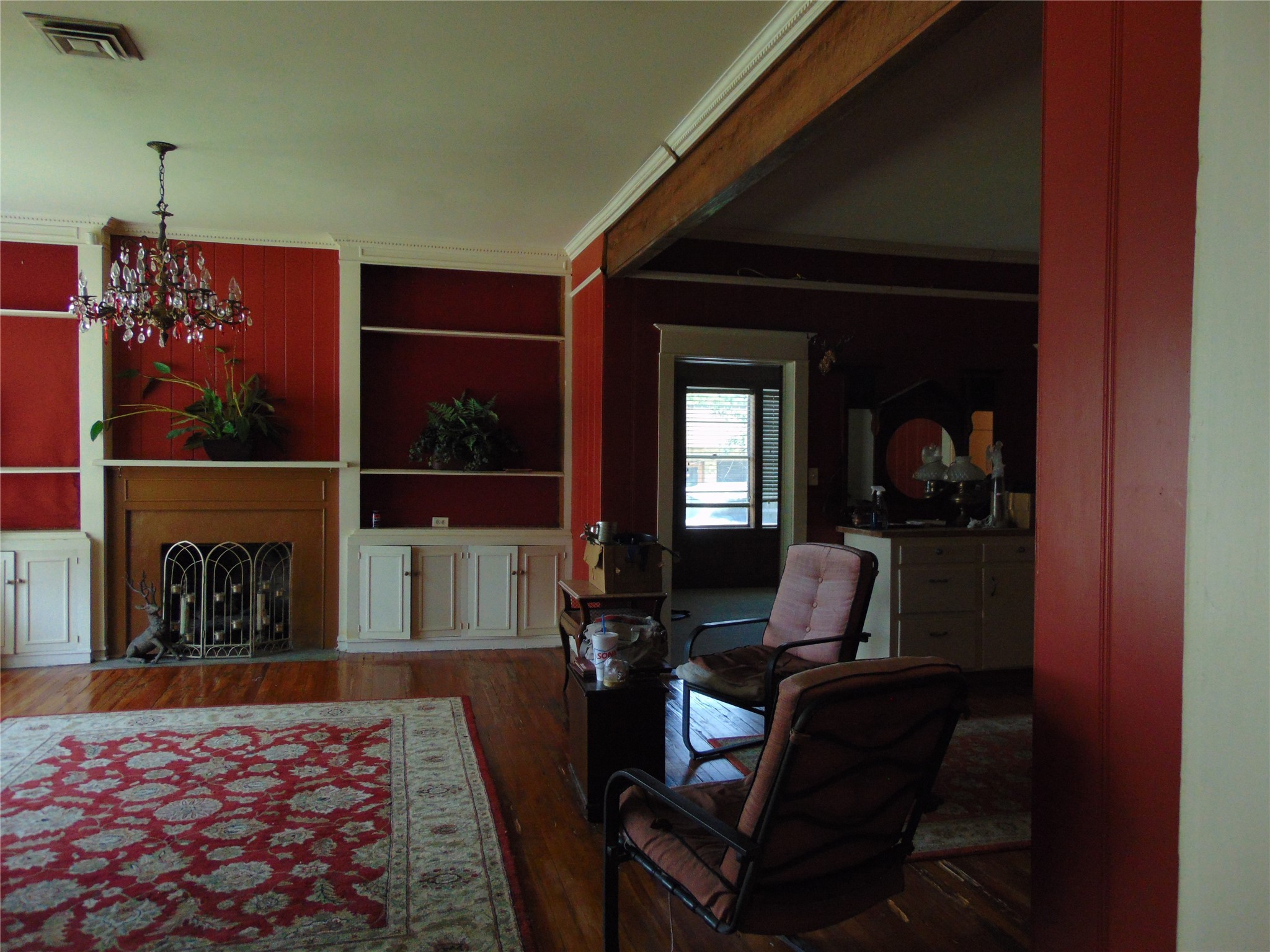 100 West Caroline Street Trinity, TX 75862 - Photo 18 of 28 a living room with furniture and a fireplace