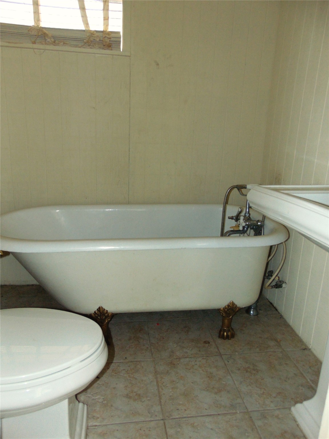 100 West Caroline Street Trinity, TX 75862 - Photo 23 of 28 a bathroom with a sink and a toilet