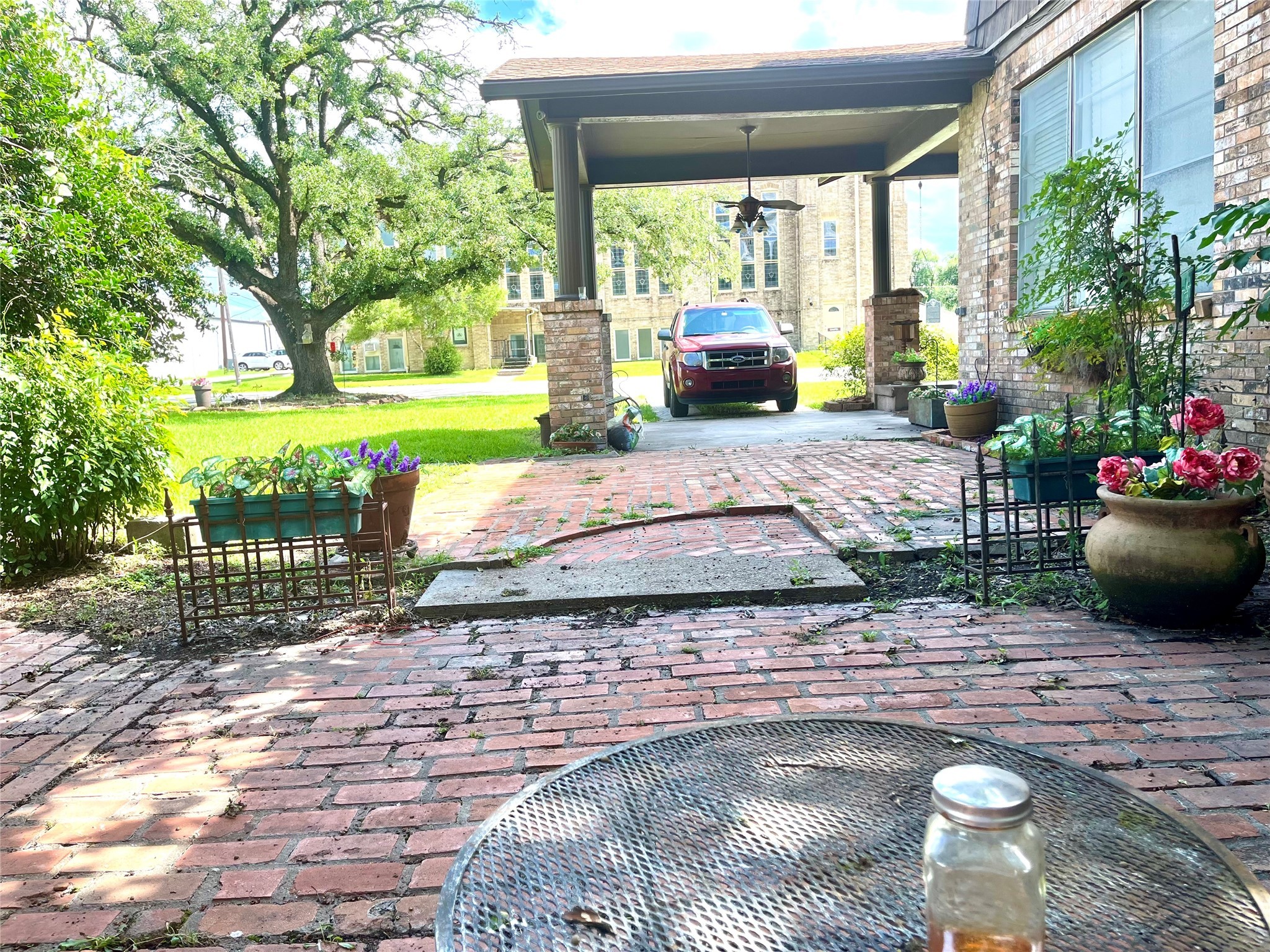 100 West Caroline Street Trinity, TX 75862 - Photo 27 of 28 a view of a porch with furniture and garden