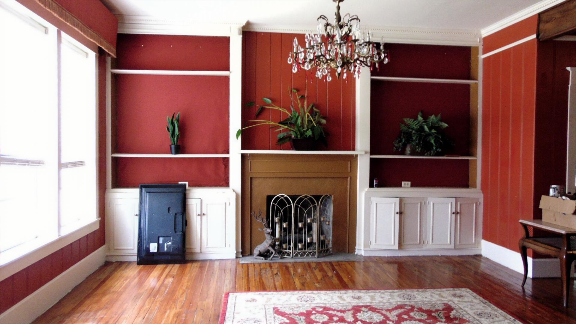100 West Caroline Street Trinity, TX 75862 - Photo 10 of 28 a view of a hallway with wooden floor and a potted plant
