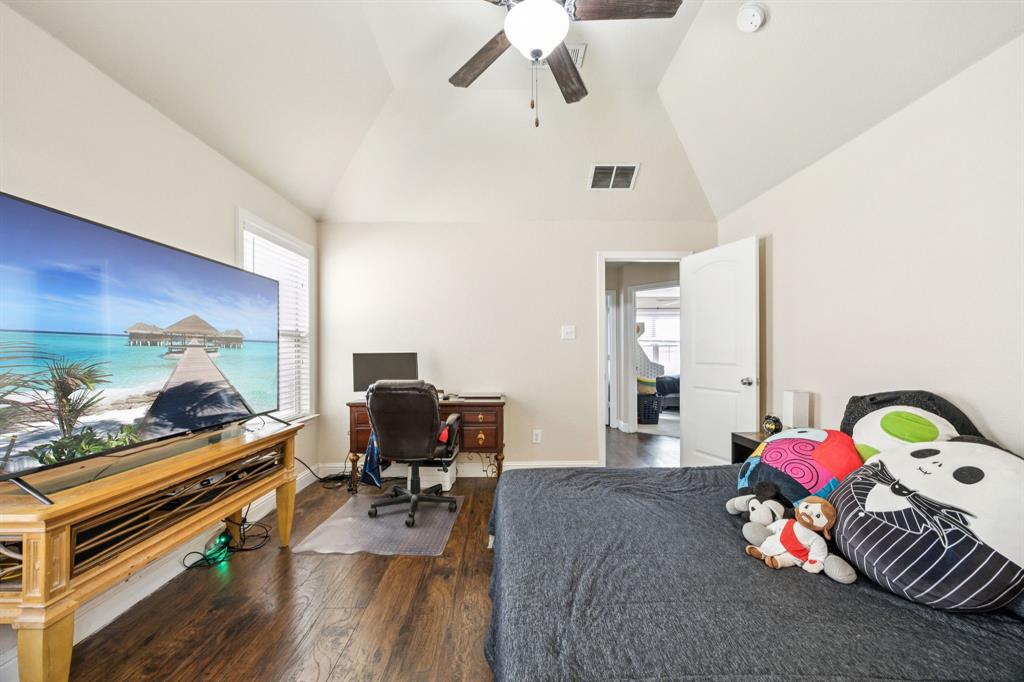 1601 Applegate Way Royse City, TX 75189 - Photo 14 of 28 a bedroom with furniture and a wooden floor