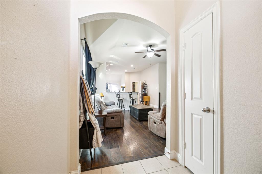 1601 Applegate Way Royse City, TX 75189 - Photo 2 of 28 a living room with furniture and a chandelier