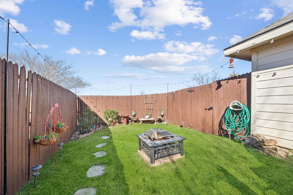 1601 Applegate Way Royse City, TX 75189 - Photo 23 of 28 a view of a backyard with sitting area